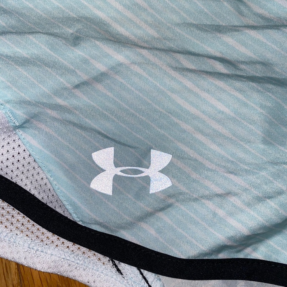 L Under Armer white and teal striped shorts